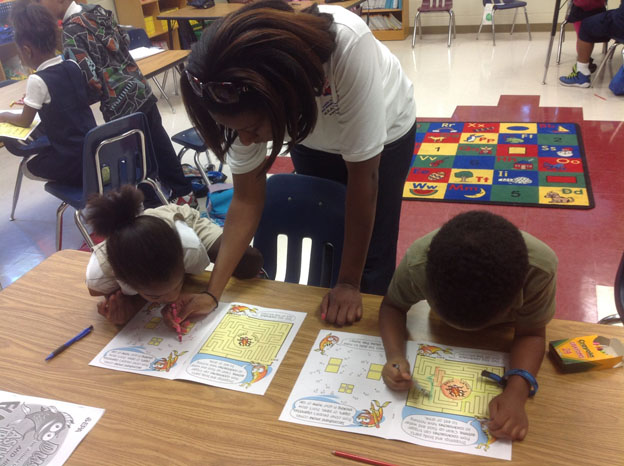 Children working in workbooks